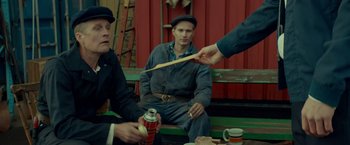 Movie still from “A Man Called Ove” (2015), directed by Hannes Holm – A group of men sitting on a bench; Medium shot, Over the shoulder angle