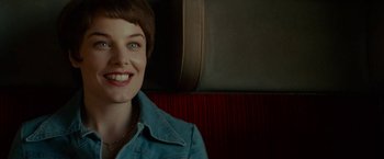 Movie still from “A Man Called Ove” (2015), directed by Hannes Holm – A person sitting on a train; Close Up shot, Over the shoulder angle