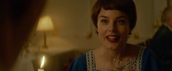 Movie still from “A Man Called Ove” (2015), directed by Hannes Holm – A person with a glass of wine; Close Up shot, Over the shoulder angle