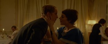 Movie still from “A Man Called Ove” (2015), directed by Hannes Holm – A man and a woman touching their faces together; Close Up shot, Low angle