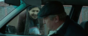 Movie still from “A Man Called Ove” (2015), directed by Hannes Holm – A man and a woman in the back of a car; Close Up shot, Over the shoulder angle