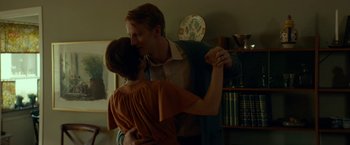 Movie still from “A Man Called Ove” (2015), directed by Hannes Holm – A man and a woman dancing in a living room; Medium shot, Low angle