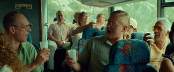 Movie still from “A Man Called Ove” (2015), directed by Hannes Holm – A group of people sitting on a bus; Medium shot, Over the shoulder angle