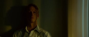 Movie still from “A Man Called Ove” (2015), directed by Hannes Holm – A man in a white dress shirt is in the dark; Close Up shot, Low angle