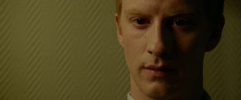 Movie still from “A Man Called Ove” (2015), directed by Hannes Holm – A man's face in a room; Close Up shot, High angle