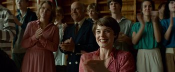 Movie still from “A Man Called Ove” (2015), directed by Hannes Holm – A group of people standing in a room; Medium shot, Over the shoulder angle