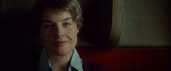 Movie still from “A Man Called Ove” (2015), directed by Hannes Holm – A person sitting on a train; Close Up shot, Over the shoulder angle