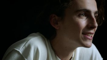 Movie still from “A Man Named Scott” (2021), directed by Robert Alexander – A person wearing a white shirt; Close Up shot, High angle