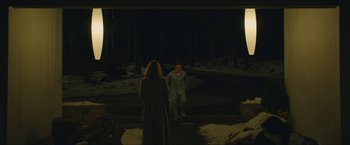Movie still from “A Most Violent Year” (2014), directed by J.C. Chandor – A man and a woman are standing in the dark; Wide shot, Over the shoulder angle