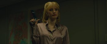 Movie still from “A Most Violent Year” (2014), directed by J.C. Chandor – A woman holding a gun in a room; Close Up shot, Low angle