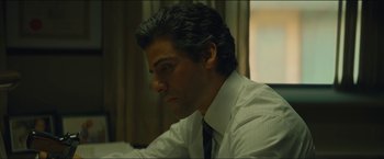 Movie still from “A Most Violent Year” (2014), directed by J.C. Chandor – A person wearing a shirt and tie; Close Up shot, Over the shoulder angle