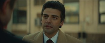 Movie still from “A Most Violent Year” (2014), directed by J.C. Chandor – A person wearing a suit and tie; Close Up shot, Over the shoulder angle