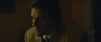 Movie still from “A Most Violent Year” (2014), directed by J.C. Chandor – A person wearing a suit and tie; Close Up shot, Over the shoulder angle