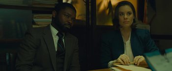 Movie still from “A Most Violent Year” (2014), directed by J.C. Chandor – A man and a woman sitting at a dinner table; Medium shot, Over the shoulder angle