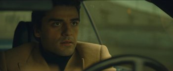 Movie still from “A Most Violent Year” (2014), directed by J.C. Chandor – A person sitting in a car; Close Up shot, Low angle