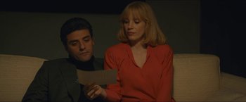 Movie still from “A Most Violent Year” (2014), directed by J.C. Chandor – A man and a woman looking at a piece of paper; Medium shot, Over the shoulder angle