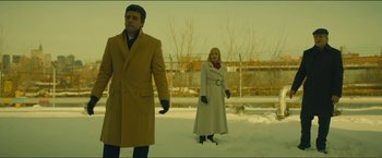 Movie still from “A Most Violent Year” (2014), directed by J.C. Chandor – A man and a woman standing next to each other in the snow; Medium shot, Low angle
