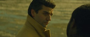 Movie still from “A Most Violent Year” (2014), directed by J.C. Chandor – A person wearing a yellow coat; Close Up shot, Over the shoulder angle