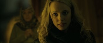 Movie still from “A Most Wanted Man” (2014), directed by Anton Corbijn – A person with long blonde hair; Close Up shot, Over the shoulder angle