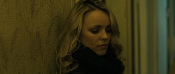 Movie still from “A Most Wanted Man” (2014), directed by Anton Corbijn – A woman with long blonde hair wearing a black scarf; Close Up shot, Low angle