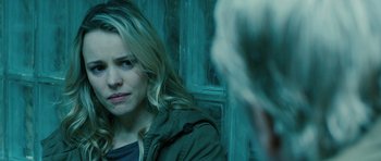 Movie still from “A Most Wanted Man” (2014), directed by Anton Corbijn – A woman is looking at a man in a green jacket; Close Up shot, Over the shoulder angle