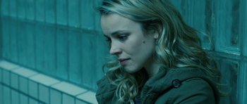 Movie still from “A Most Wanted Man” (2014), directed by Anton Corbijn – A person with long hair; Close Up shot, Over the shoulder angle