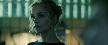 Movie still from “A Most Wanted Man” (2014), directed by Anton Corbijn – A person wearing a black shirt; Close Up shot, Low angle