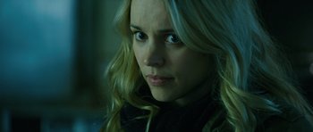 Movie still from “A Most Wanted Man” (2014), directed by Anton Corbijn – A person with long blonde hair; Close Up shot, Over the shoulder angle