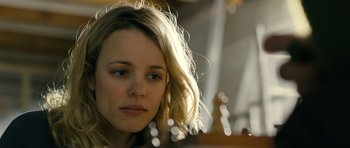 Movie still from “A Most Wanted Man” (2014), directed by Anton Corbijn – A person sitting in front of a chess board; Close Up shot, Over the shoulder angle