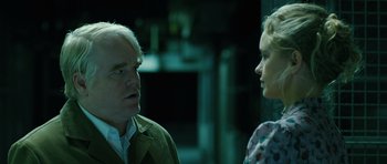 Movie still from “A Most Wanted Man” (2014), directed by Anton Corbijn – A man and a woman talking to each other; Close Up shot, Over the shoulder angle