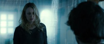 Movie still from “A Most Wanted Man” (2014), directed by Anton Corbijn – A woman standing in front of a mirror; Close Up shot, Over the shoulder angle