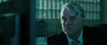 Movie still from “A Most Wanted Man” (2014), directed by Anton Corbijn – A man in a suit and tie; Close Up shot, Over the shoulder angle