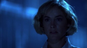 Movie still from “A Nightmare on Elm Street” (1984), directed by Wes Craven – A person with short blonde hair; Close Up shot, Low angle