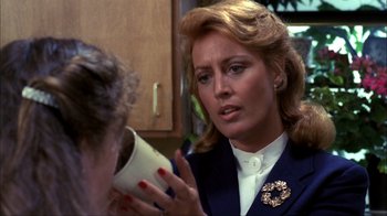 Movie still from “A Nightmare on Elm Street” (1984), directed by Wes Craven – A woman is talking to another woman in a kitchen; Close Up shot, Over the shoulder angle