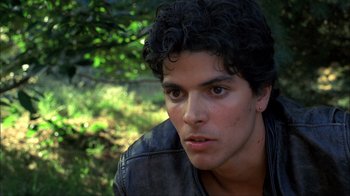 Movie still from “A Nightmare on Elm Street” (1984), directed by Wes Craven – A person wearing a leather jacket; Close Up shot, High angle
