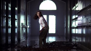 Movie still from “A Nightmare on Elm Street” (1984), directed by Wes Craven – A woman standing in front of an open door; Wide shot, Low angle