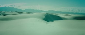 Movie still from “A Quiet Place Part II” (2020), directed by John Krasinski – A view of a desert landscape with mountains in the background; Extreme Wide shot, High angle