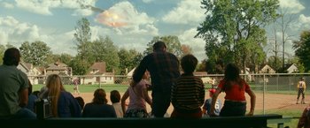 Movie still from “A Quiet Place Part II” (2020), directed by John Krasinski – A group of people standing on top of a field; Extreme Wide shot, Over the shoulder angle