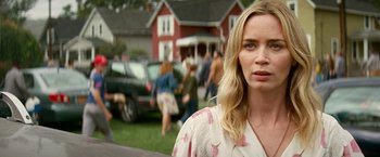 Movie still from “A Quiet Place Part II” (2020), directed by John Krasinski – A woman standing in front of a group of people; Close Up shot, Over the shoulder angle