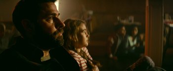 Movie still from “A Quiet Place Part II” (2020), directed by John Krasinski – A man and a little girl sitting next to each other; Close Up shot, Low angle