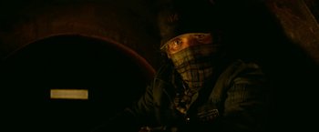 Movie still from “A Quiet Place Part II” (2020), directed by John Krasinski – A man wearing a hat and wearing a jacket and a hat; Close Up shot, Overhead angle