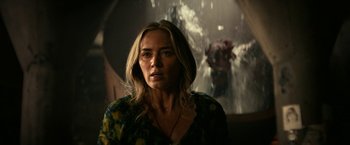 Movie still from “A Quiet Place Part II” (2020), directed by John Krasinski – A person wearing a dress; Close Up shot, Over the shoulder angle