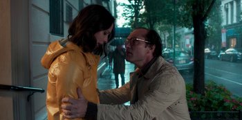 Movie still from “A Rainy Day in New York” (2019), directed by Woody Allen – A man and a woman standing next to each other on the street; Medium shot, Over the shoulder angle