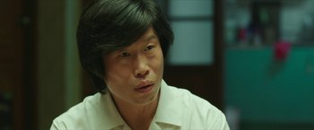 A person wearing a white shirt