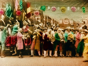Movie still from “A Trip to the Moon” (1902), directed by Georges Méliès – A group of people standing in front of a wall; Wide shot, High angle