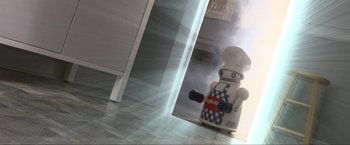 Movie still from “A Very Harold & Kumar Christmas” (2011), directed by Todd Strauss-Schulson – A robot is standing in front of a mirror; Extreme Close Up shot, Low angle