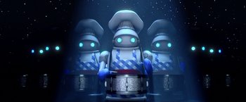 Movie still from “A Very Harold & Kumar Christmas” (2011), directed by Todd Strauss-Schulson – A group of robots are playing drums in a dark room; Medium shot, Low angle