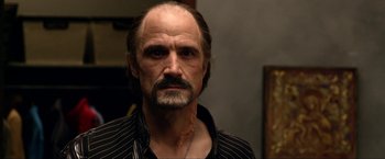 Movie still from “A Very Harold & Kumar Christmas” (2011), directed by Todd Strauss-Schulson – A person with a beard; Close Up shot, Over the shoulder angle