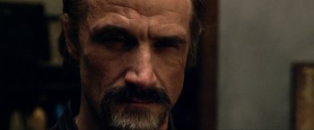 Movie still from “A Very Harold & Kumar Christmas” (2011), directed by Todd Strauss-Schulson – A man with a beard and mustache; Close Up shot, Over the shoulder angle