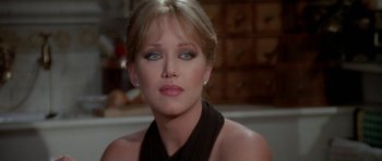 Movie still from “A View to a Kill” (1985), directed by John Glen – A person with blue eyes; Close Up shot, Over the shoulder angle